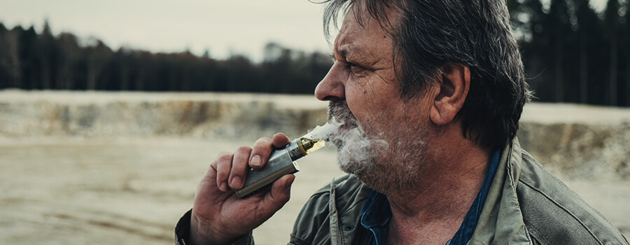 Man Vaping Cannabis Man Vaping Cannabis