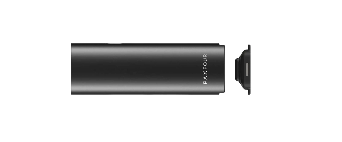 Zwarte PAX Four vaporizer horizontaal weergegeven met de ovendeksel verwijderd, met nadruk op de compacte behuizing en afneembare onderste kamer